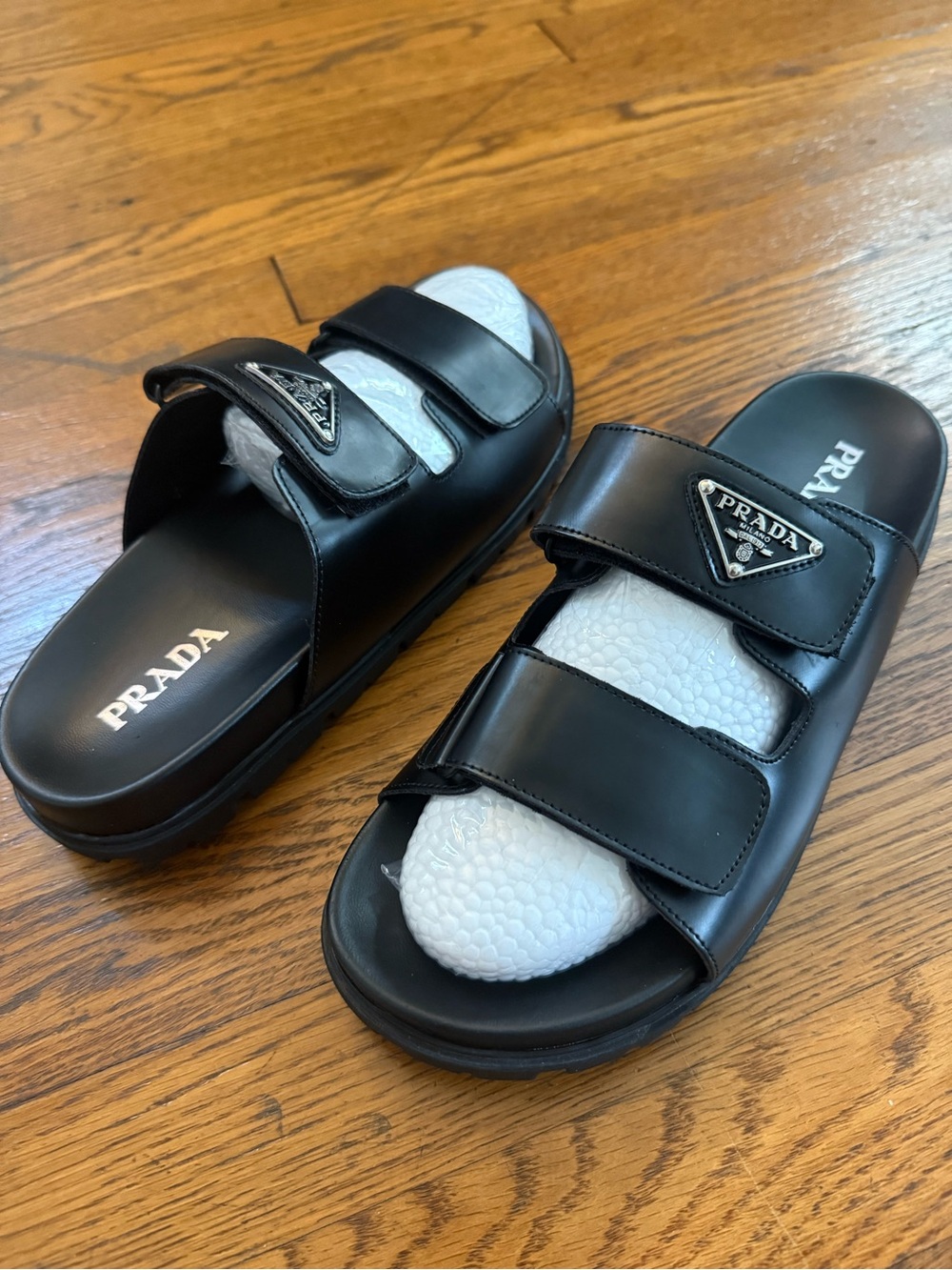 Prada Black Leather Dual-Strap Slide Sandals with Silver Logo